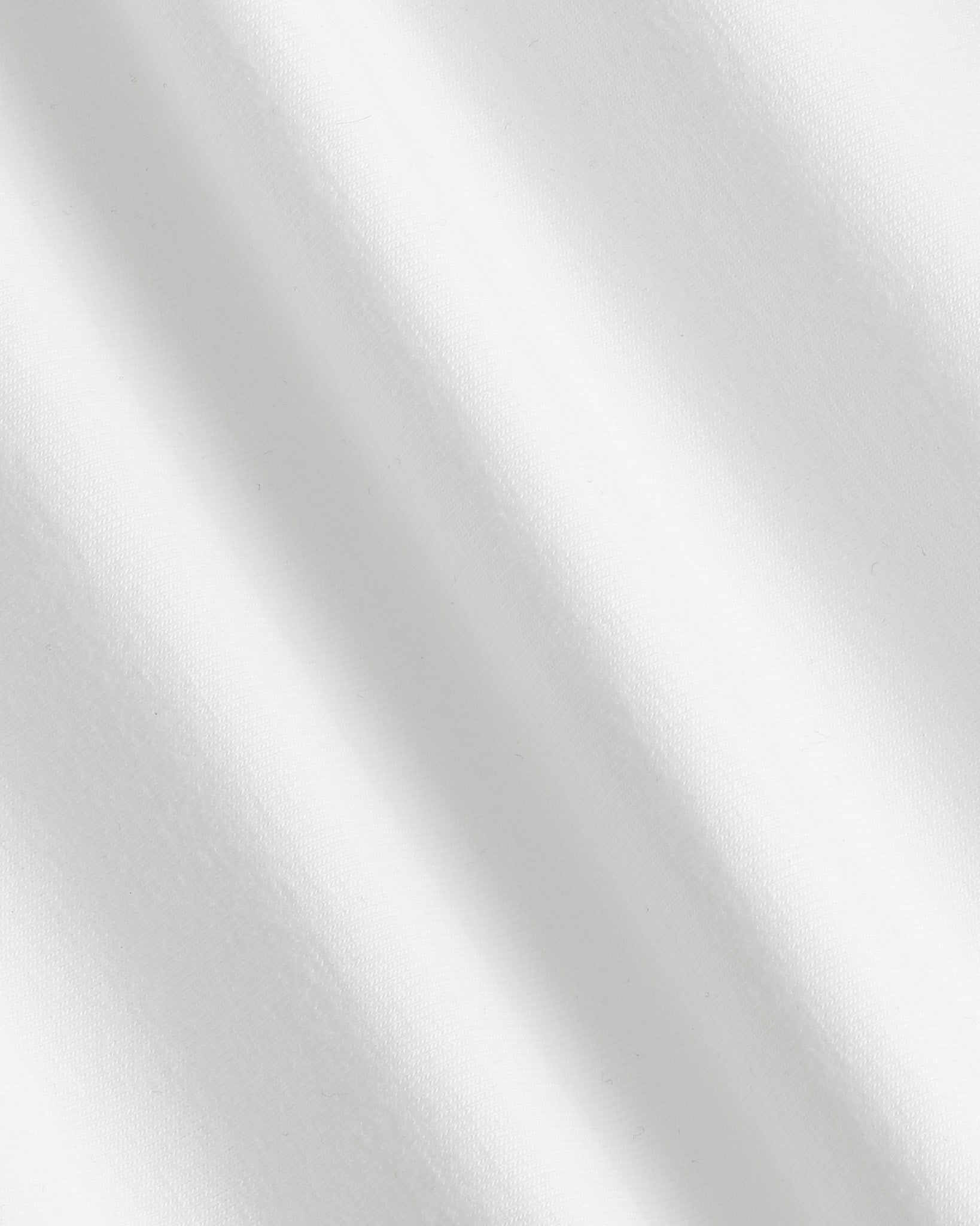 Vit golftröja med signaturmotiv