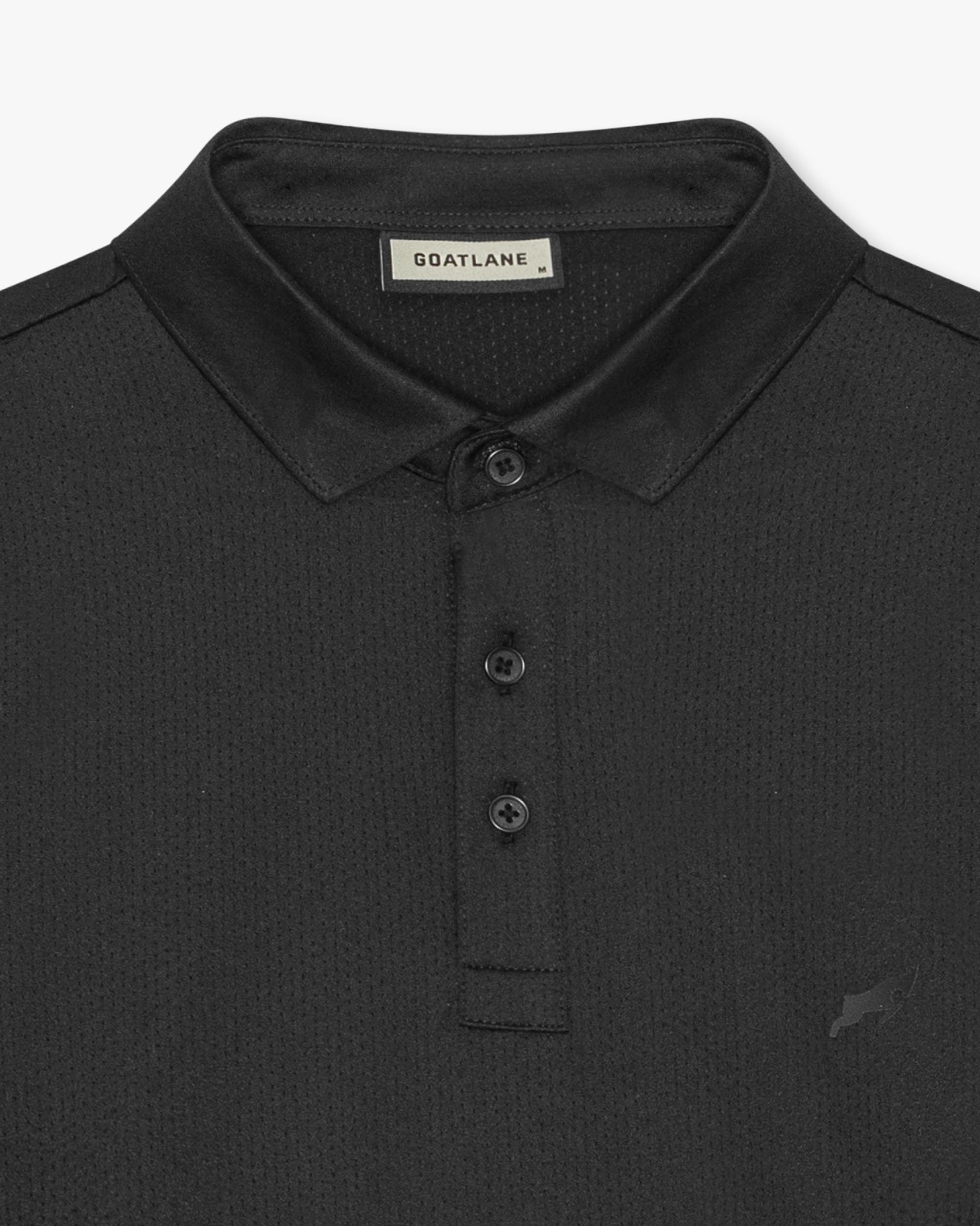 Svart golfpikétröja med mesh-teknik